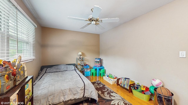 1502 S Fernandez Ave, Arlington Heights, IL 60005 - bedroom with multiple windows, wood finished floors, and a ceiling fan