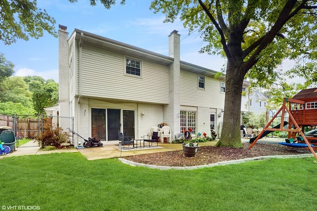 1502 S Fernandez Ave, Arlington Heights, IL 60005 - rear view of house with a chimney, a playground, a patio area, and brick siding