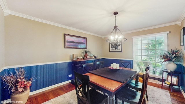 1502 S Fernandez Ave, Arlington Heights, IL 60005 - dining space with wood finished floors, a chandelier, crown molding, and a wainscoted wall
