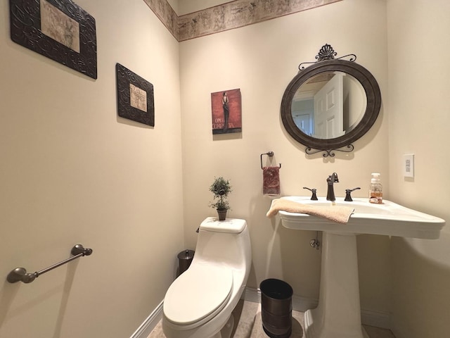 2305 Fox Run Dr, Kankakee, IL 60901 - bathroom with baseboards and toilet