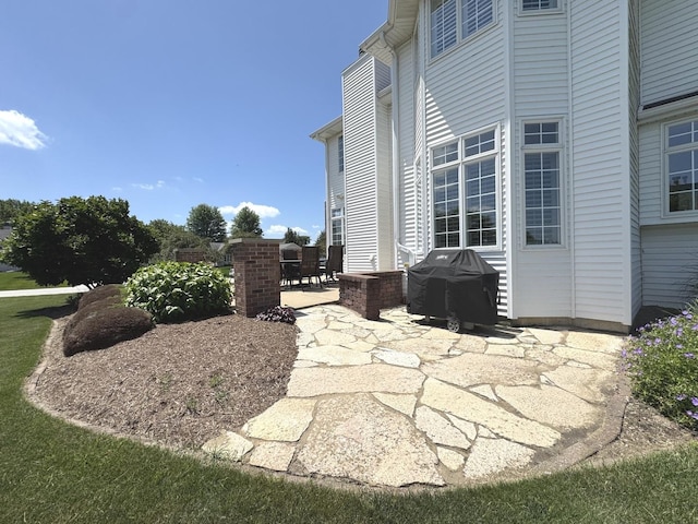 2305 Fox Run Dr, Kankakee, IL 60901 - view of patio featuring a grill
