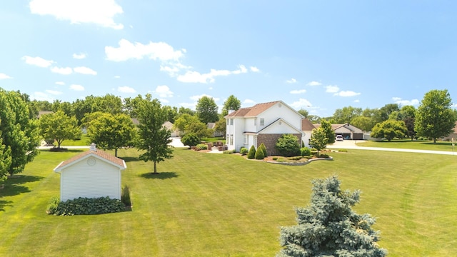 2305 Fox Run Dr, Kankakee, IL 60901 - view of property exterior with a yard and a garage