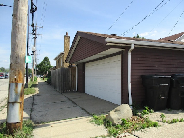 6359 W 63rd Pl, Chicago, IL 60638 - view of property exterior with a detached garage and an outdoor structure