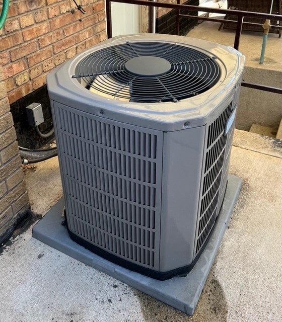 6359 W 63rd Pl, Chicago, IL 60638 - exterior view of a central air condition unit and brick siding