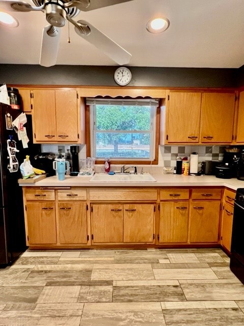 6359 W 63rd Pl, Chicago, IL 60638 - kitchen featuring ceiling fan, light countertops, range, and freestanding refrigerator