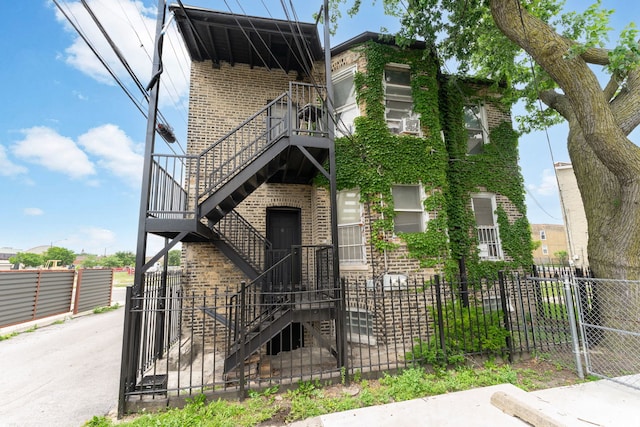 15 N Washtenaw Ave, Chicago, IL 60612 - view of front of property featuring brick siding and stairs