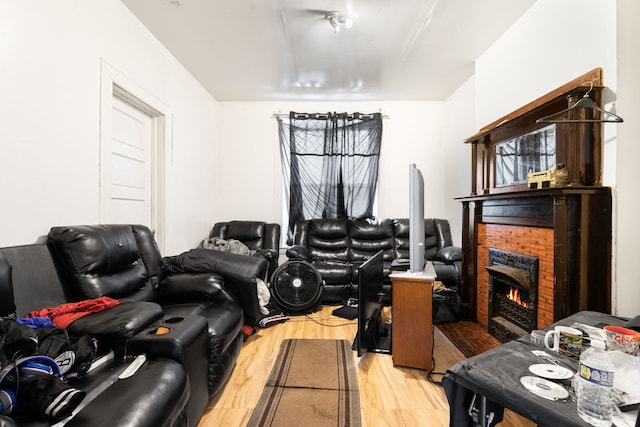 15 N Washtenaw Ave, Chicago, IL 60612 - home theater room featuring light wood finished floors and a fireplace