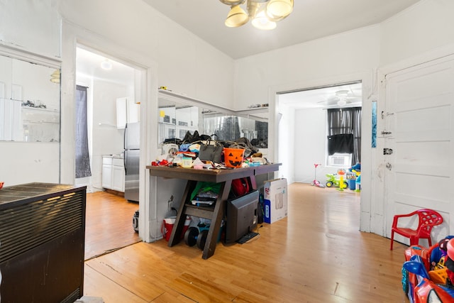 15 N Washtenaw Ave, Chicago, IL 60612 - foyer entrance with light wood-style flooring and a chandelier