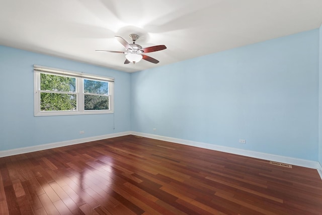 12133 Black Pine Trl, Homer Glen, IL 60491 - spare room with a ceiling fan and dark wood-style floors