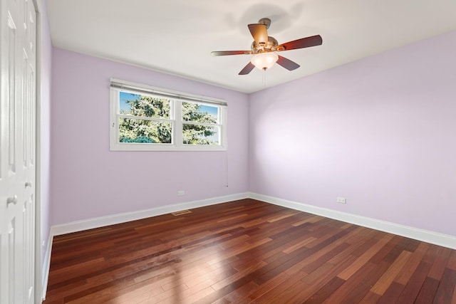 12133 Black Pine Trl, Homer Glen, IL 60491 - empty room with dark wood-style floors and ceiling fan