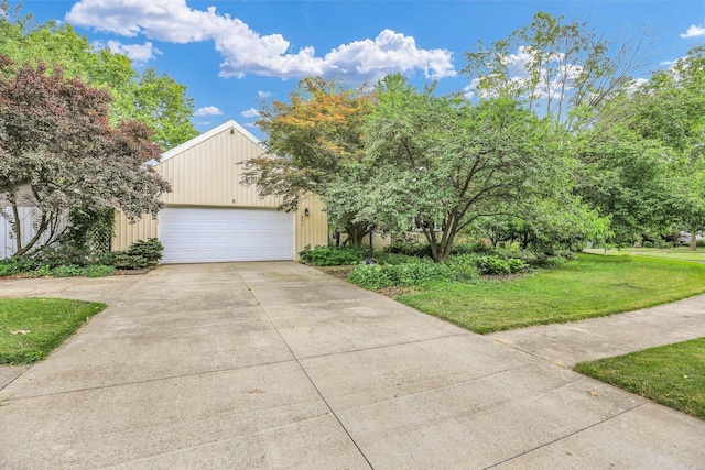 201 E Sherwin Dr, Urbana, IL 61802 - view of front facade featuring driveway, a front yard, and an attached garage