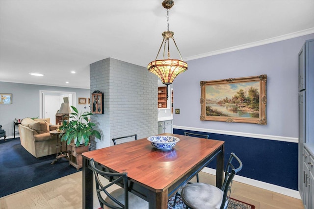 201 E Sherwin Dr, Urbana, IL 61802 - dining space with light wood-style flooring, crown molding, and recessed lighting