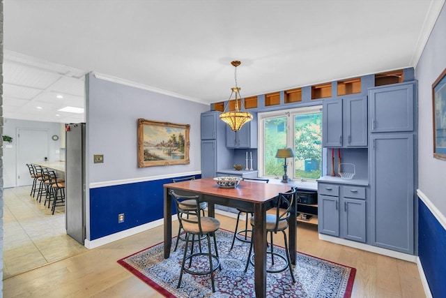 201 E Sherwin Dr, Urbana, IL 61802 - dining room featuring ornamental molding, light wood finished floors, recessed lighting, and a chandelier