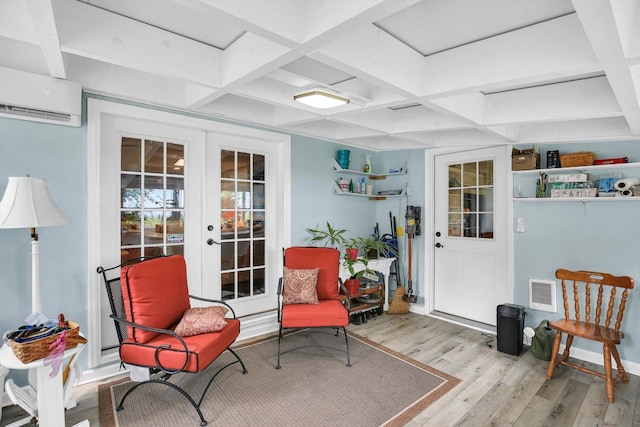 201 E Sherwin Dr, Urbana, IL 61802 - sitting room with coffered ceiling, french doors, a wall mounted air conditioner, wood finished floors, and beamed ceiling