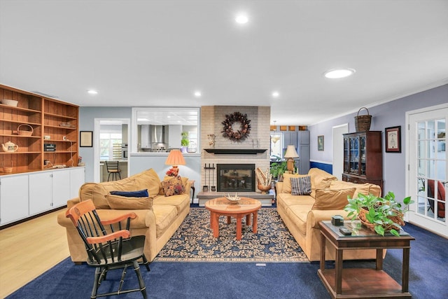 201 E Sherwin Dr, Urbana, IL 61802 - living room with a fireplace, crown molding, and recessed lighting