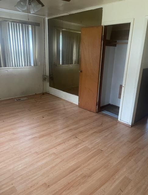 15239 Calitonia Dr, Markham, IL 60428 - unfurnished room with wood finished floors and ceiling fan