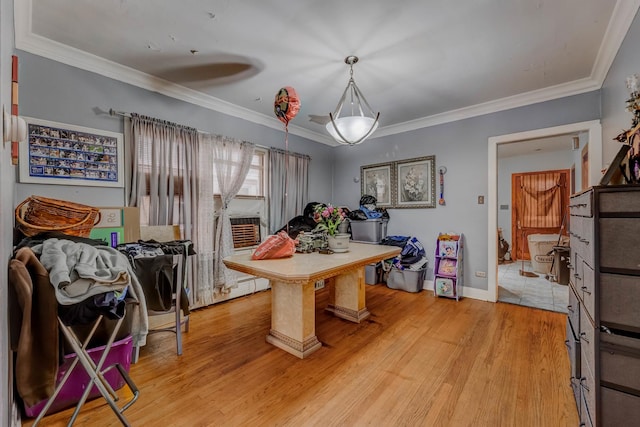 1336 Cuyler Ave, Berwyn, IL 60402 - dining space featuring light wood-style floors and crown molding