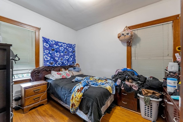 1336 Cuyler Ave, Berwyn, IL 60402 - bedroom featuring crown molding and wood finished floors
