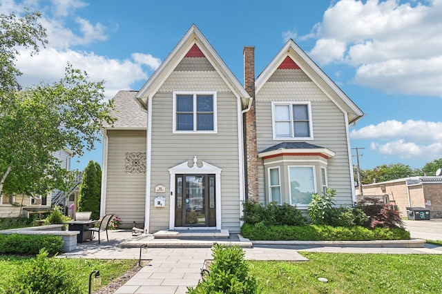30 S Slusser St, Grayslake, IL 60030 - victorian home featuring a patio