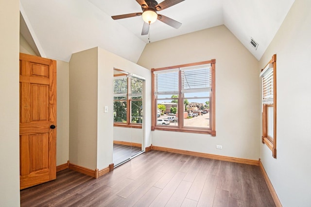 30 S Slusser St, Grayslake, IL 60030 - empty room with lofted ceiling, a ceiling fan, and wood finished floors