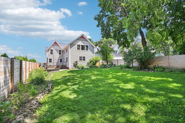 30 S Slusser St, Grayslake, IL 60030 - back of property featuring a fenced backyard