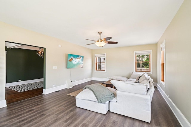 30 S Slusser St, Grayslake, IL 60030 - living area featuring dark wood-type flooring, a ceiling fan, and a chandelier