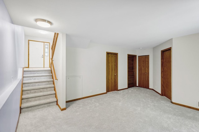 924 Millcreek Cir, Elgin, IL 60123 - below grade area featuring carpet floors and stairs