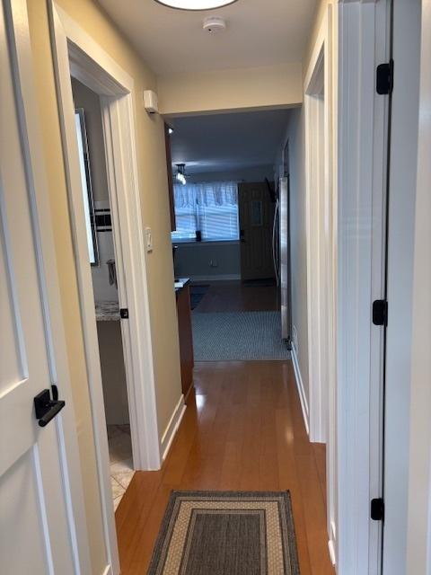 5131 S Latrobe Ave, Chicago, IL 60638 - corridor with wood finished floors and baseboards