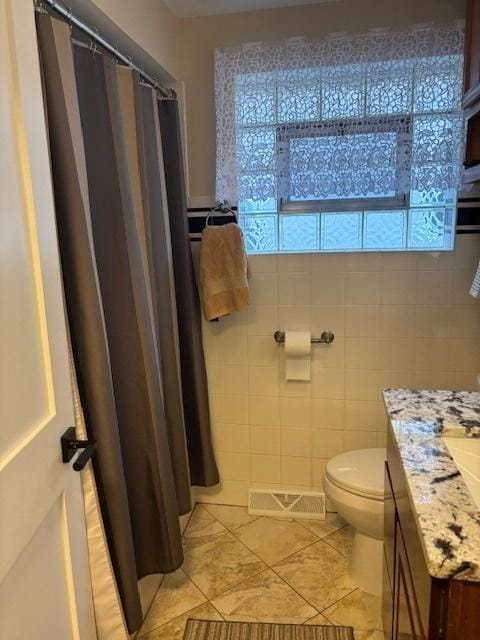 5131 S Latrobe Ave, Chicago, IL 60638 - full bath with vanity, tile patterned flooring, and a shower with shower curtain