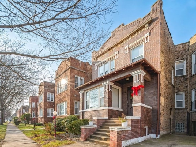 7120 S Eberhart Ave, Chicago, IL 60619 - view of front facade featuring brick siding