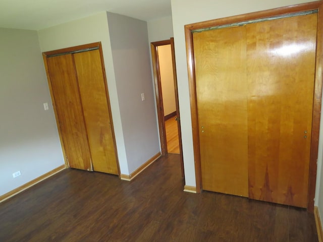 7120 S Eberhart Ave, Chicago, IL 60619 - unfurnished bedroom with wood finished floors and baseboards