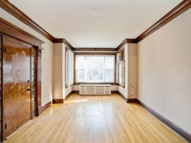 7120 S Eberhart Ave, Chicago, IL 60619 - empty room with crown molding and light wood finished floors