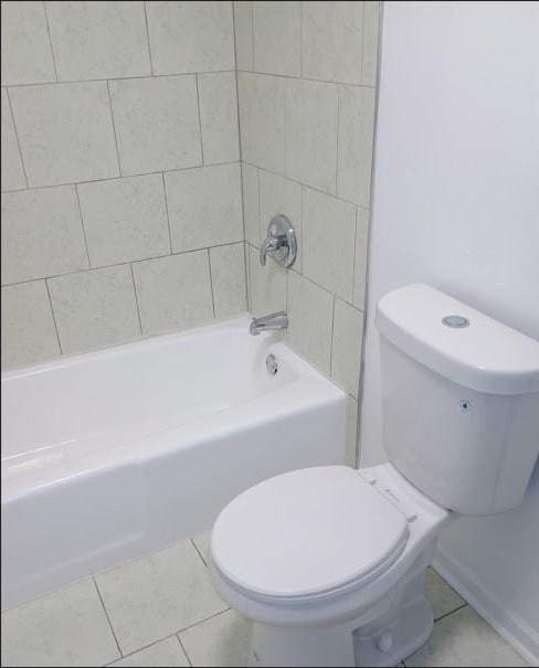 6084 S 75th Ave, Summit, IL 60501 - full bathroom featuring tile patterned flooring and bathtub / shower combination