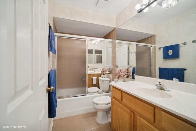 1280 Rudolph Rd Unit 1K, Northbrook, IL 60062 - bathroom with vanity, bath / shower combo with glass door, and tile patterned flooring