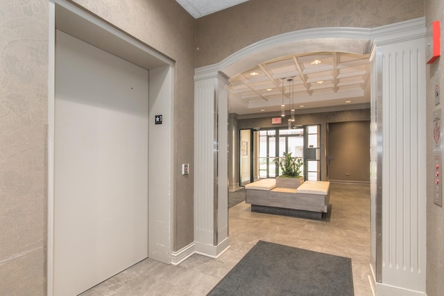 750 Pearson St Unit 904, Des Plaines, IL 60016 - hallway with coffered ceiling, elevator, arched walkways, ornate columns, and beamed ceiling