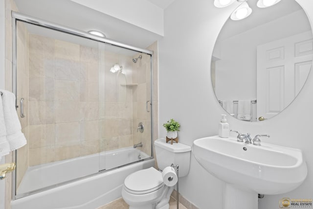 3507 N Reta Ave Unit 4, Chicago, IL 60657 - bathroom featuring toilet and shower / bath combination with glass door