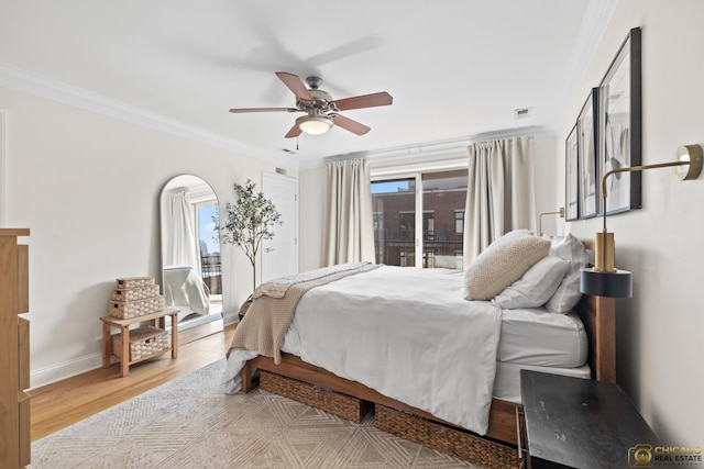 3507 N Reta Ave Unit 4, Chicago, IL 60657 - bedroom with crown molding, access to exterior, light wood finished floors, and ceiling fan