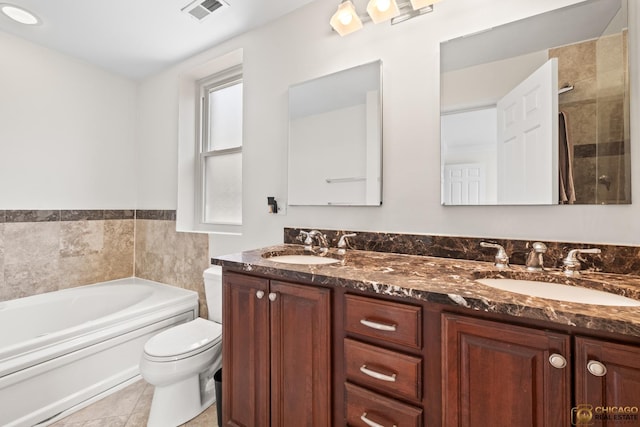 3507 N Reta Ave Unit 4, Chicago, IL 60657 - bathroom featuring double vanity, a bath, and a tile shower