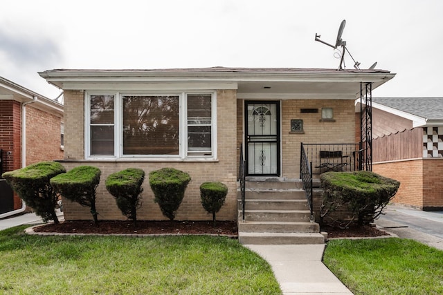 16530 Emerald Ave, Harvey, IL 60426 - view of front of home featuring brick siding and a porch