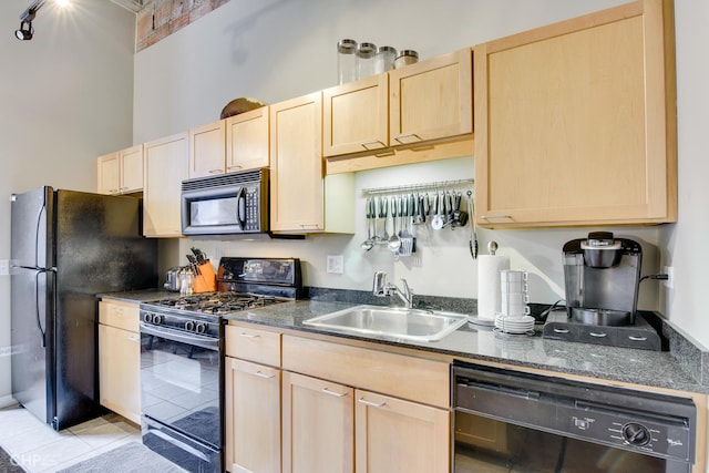 20 N State St Unit 909, Chicago, IL 60602 - kitchen featuring black appliances, light brown cabinets, and light tile patterned floors