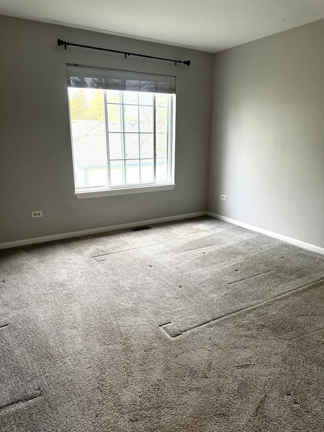 26296 N Green St Unit 5C, Mundelein, IL 60060 - carpeted spare room featuring baseboards
