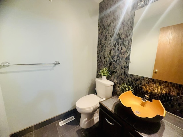 26296 N Green St Unit 5C, Mundelein, IL 60060 - half bathroom with vanity, tile walls, and tile patterned floors