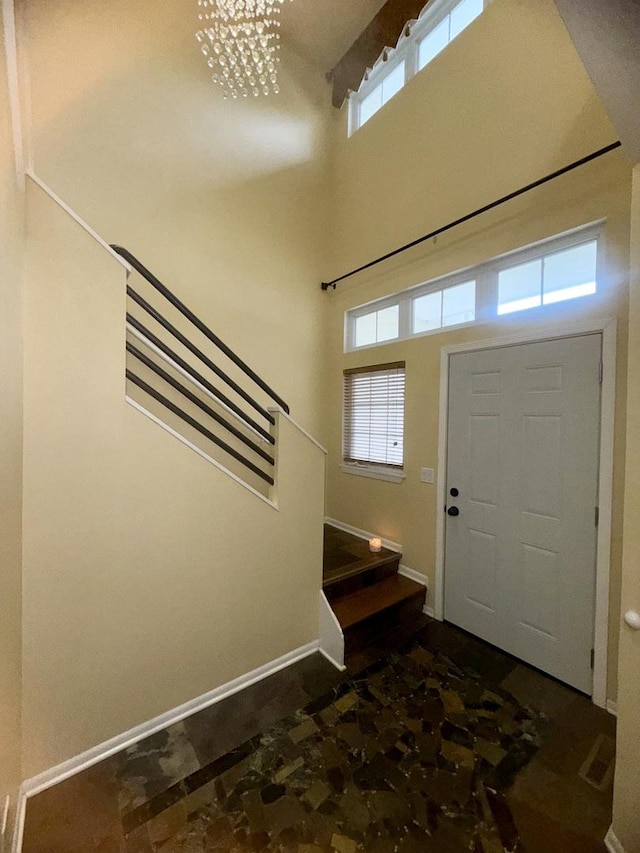 26296 N Green St Unit 5C, Mundelein, IL 60060 - foyer with a chandelier, stairway, and a high ceiling