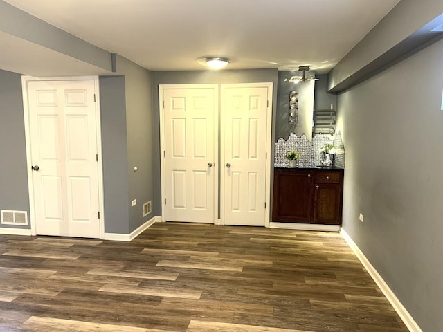 26296 N Green St Unit 5C, Mundelein, IL 60060 - interior space with dark wood finished floors and baseboards