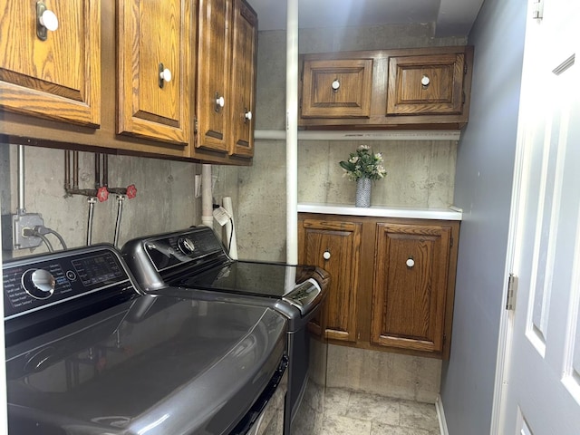 26296 N Green St Unit 5C, Mundelein, IL 60060 - laundry area featuring cabinet space and washer and dryer