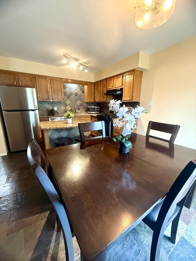 26296 N Green St Unit 5C, Mundelein, IL 60060 - dining space with stone tile flooring