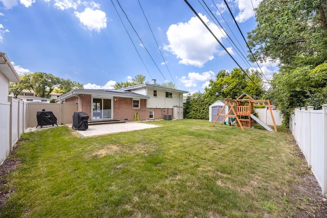 9070 Shady Ln, Hickory Hills, IL 60457 - fenced backyard featuring a playground and a patio area