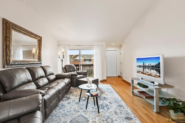 6561 W School Ave Unit 305C, Chicago, IL 60634 - living room featuring light wood-style flooring and baseboards