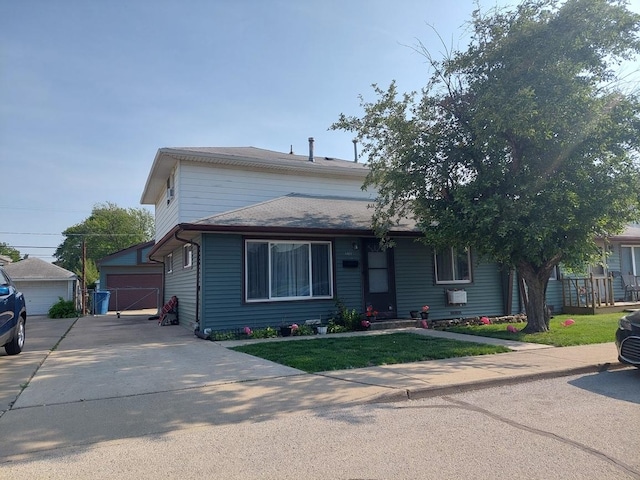 4421 W 87th St, Hometown, IL 60456 - view of front facade featuring a front yard, a detached garage, and an outdoor structure