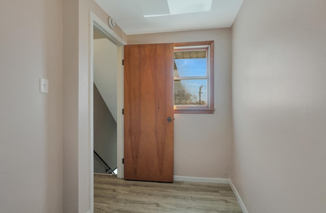 4421 W 87th St, Hometown, IL 60456 - hall featuring an upstairs landing, wood finished floors, and a skylight